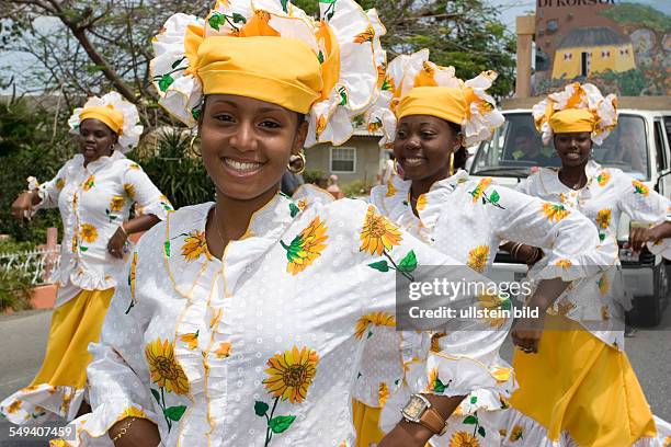 Netherlands Antills, Curacao, Willemstad, harvest festival, several groups in traditional clothing during a parade