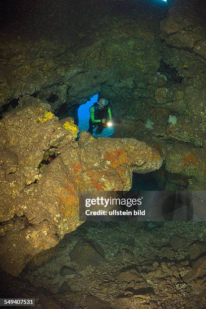 Diver at Caves of Lava Tubes, Cathedrals of Lanai, Maui, Hawaii, USA