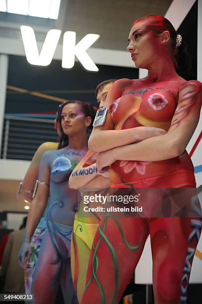 Germany, Hannover, Promoter at the CeBit 2006; bodypainting.