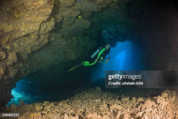 Diver at Caves of Lava Tubes, Cathedrals of Lanai, Maui, Hawaii, USA