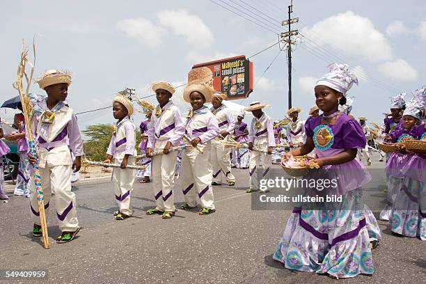 Netherlands Antills, Curacao, Willemstad, harvest festival, several groups in traditional clothing during a parade