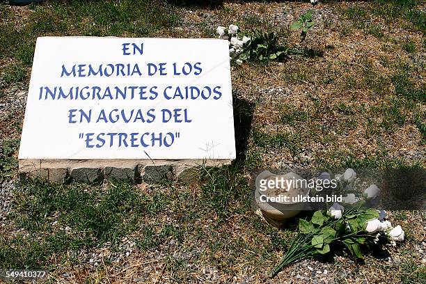 Spain, Tarifa, a memorial stone for immigrants who died by the attempt to cross the straits of Gibraltar.