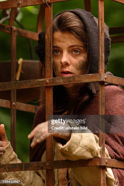 Germany, NRW, Dortmund: The Spectaculum from medieval times. A young woman plays the role of a woman being in the pillory