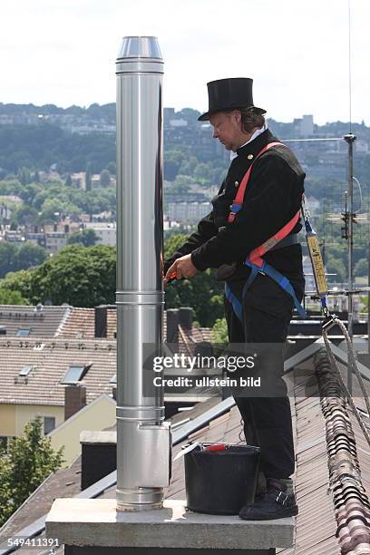 Germany, Wuppertal. Chimney sweep