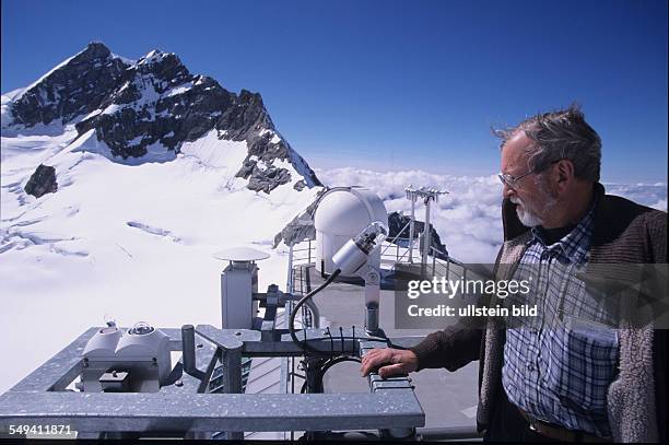 Switzerland, Top of Europe, the sphinx observatory. Research station, the mountain Monk in the background