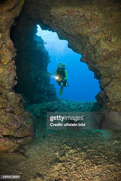 Diver at Caves of Lava Tubes, Cathedrals of Lanai, Maui, Hawaii, USA