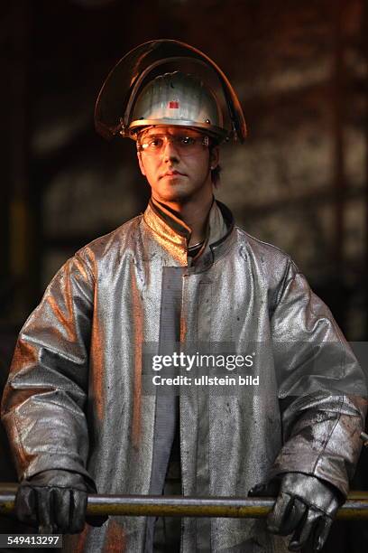 Germany, Muehlheim: The mechanical workshop of the Friedrich-Wilhelm steelworks. A worker in protective clothes