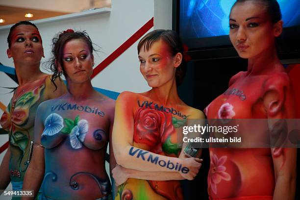 Germany, Hannover, Promoter at the CeBit 2006; bodypainting.