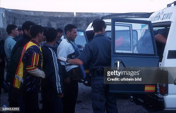 Spain, Africans try to immigrate over the straits of Gibraltar. The refugees are arrested by the Guardia Civil in Tarifa after their arrival.