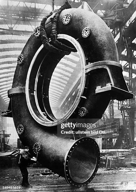 Germany Free State Prussia Rhine-Province Essen: Friedrich Krupp AG in Essen: Production of a giant steel volute case for a turbine - - undated -...