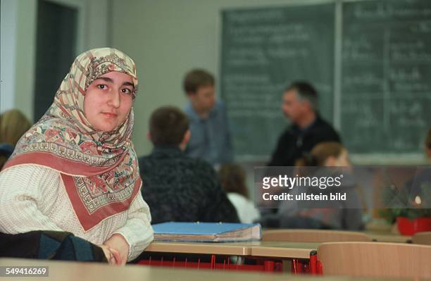 Germany, Siegen, : a Turkish German, Nursen Elemenler , having classes in the Prince-Johann Moritz-secondary school - senior class .