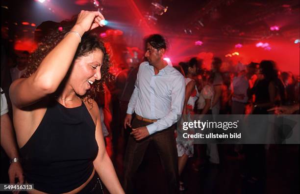 Germany, Bochum, 06.2002: Turkish Nights in the Ruhr Area.- Europe s greatest Turkish discotheque TAKSIM ; Turks dancing.