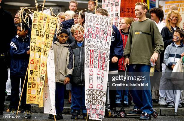 Germany, Essen: Reaction after he terrorist attack in the USA.- Carnival of cultures; peace parade of the cultures, german and foreign spectators.