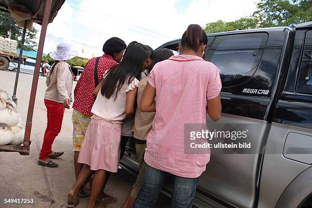 Thailand,Aranyaprathet, border aera to Cambodia. Child prostitutes waiting for customers