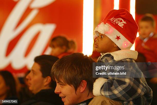 Germany, Christmas market, Coca Cola truck, little Child