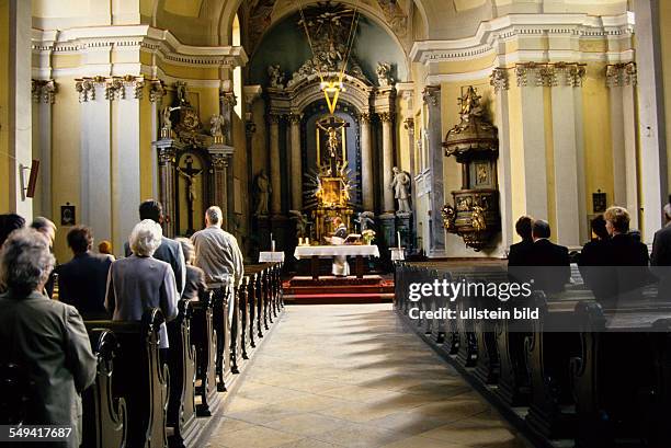 Hungary, Budapest: a service in a church.