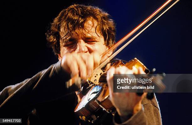 Germany: The Farfarello music group; Mani Neumann, violin.