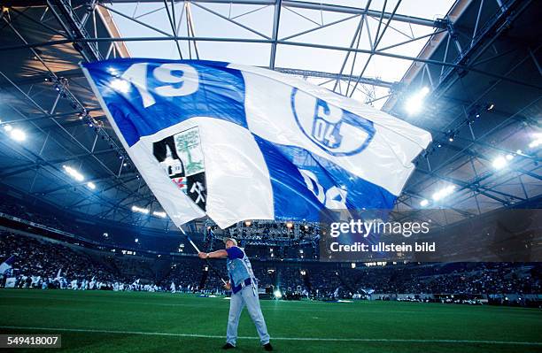 Germany, Gelsenkirchen: Schalke 04 Arena.- Opening event 2001; fanatics in the arena.
