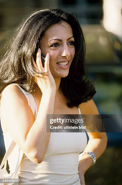 Germany, Berlin: Young Turk with a mobile phone.