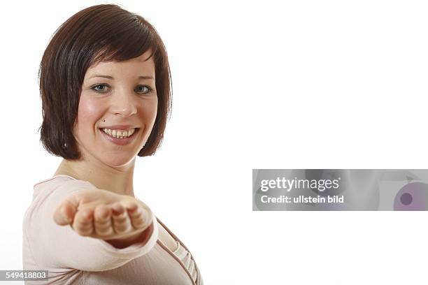 Germany, Essen, young woman doing yoga