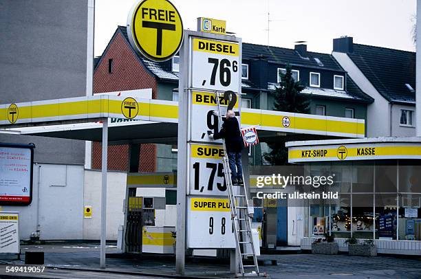 Germany: Change over to the euro.- Petrol station.