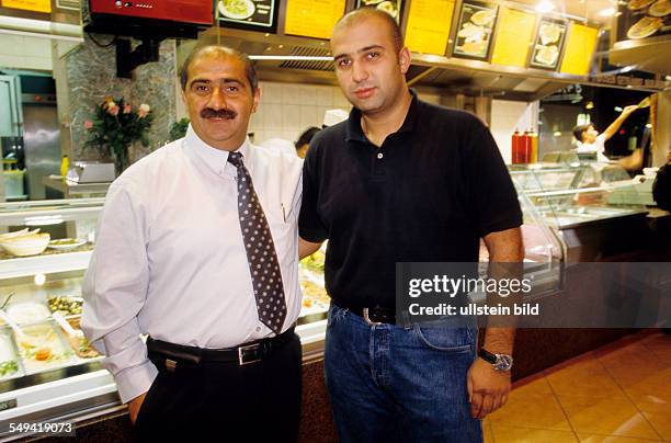 Deutschland, Berlin: Remzi Kaplan, owner of the Kaplan GmbH (doner kebab production and meat whole-sale trade with his son Remzi, manager of the...