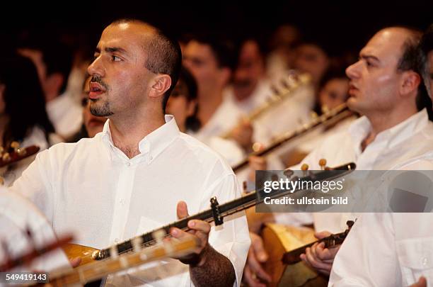Germany, Cologne: Cultural festival, epic of the millenium.- Ca. 1200 saz players performing together with the symphony orchestra of Cologne.