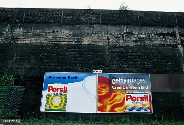 Germany, Duisburg: Poster walls in a town square.