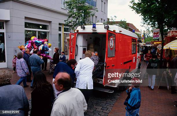 Germany, Essen, : City.- An ambulance being on duty.