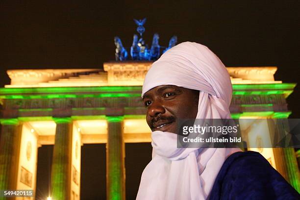 Germany, Berlin: Brandenburger Gate. Mr. Mano Aghali is Tuareg member of the Nigerian parliament and member of the Panafrican parliament.