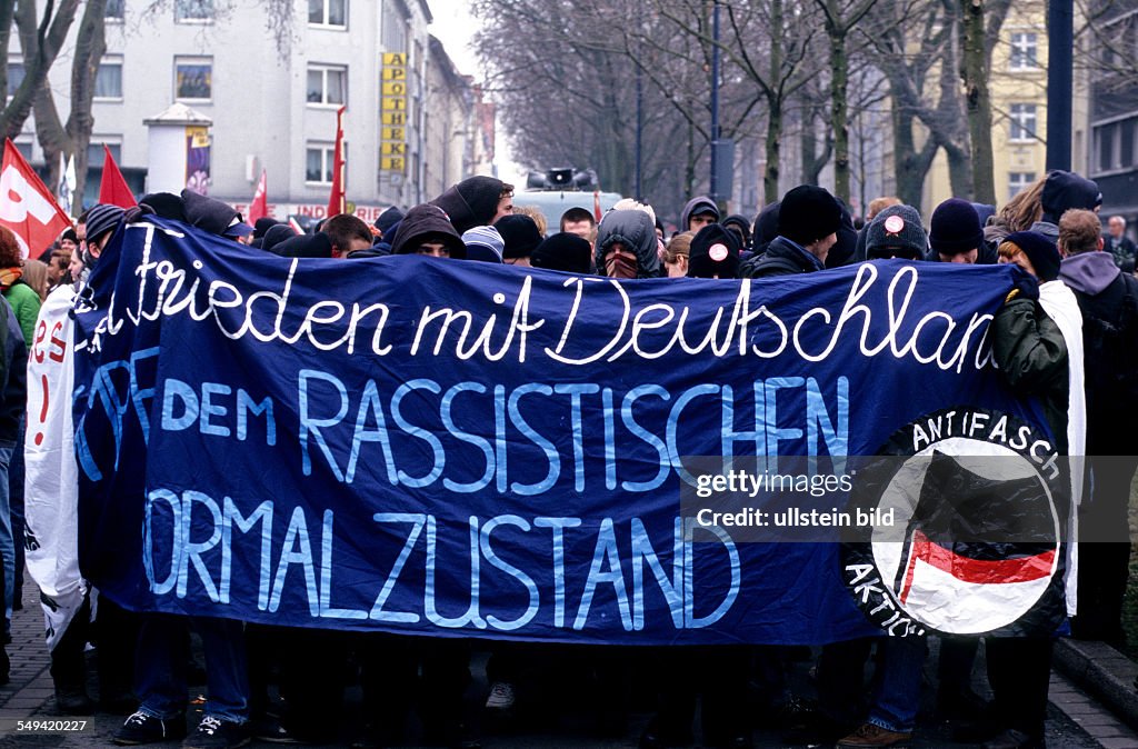 DEU, Germany, Dortmund: Nazi marching up in the north part of Dortmunds city.- Great interest of foreigners; counterdemonstrators.