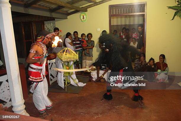 Sri Lanka, Kandy. A buddhist healing- and excorzist ceremony. Since 200 years in the fourth generation the Kaggadiya practise exorcism and astrology....