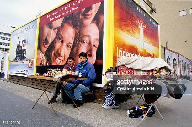 Germany, Berlin: Kreuzberg.- Friedrich Street; souvenir stand with remains of the Wall, jewellery, etc.