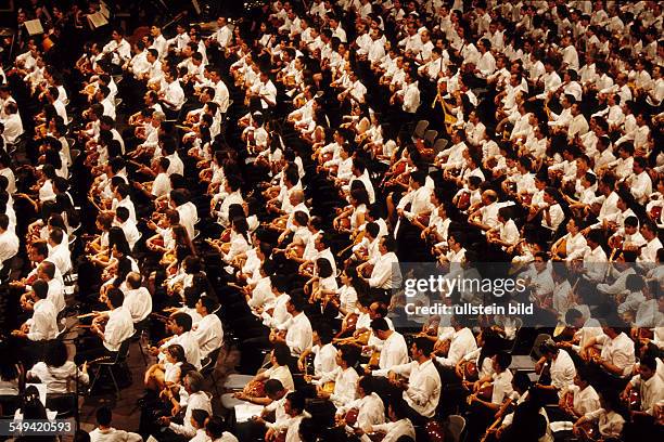 Germany, Cologne: Cultural festival, epic of the millenium.- Ca. 1200 saz players performing together with the symphony orchestra of Cologne.