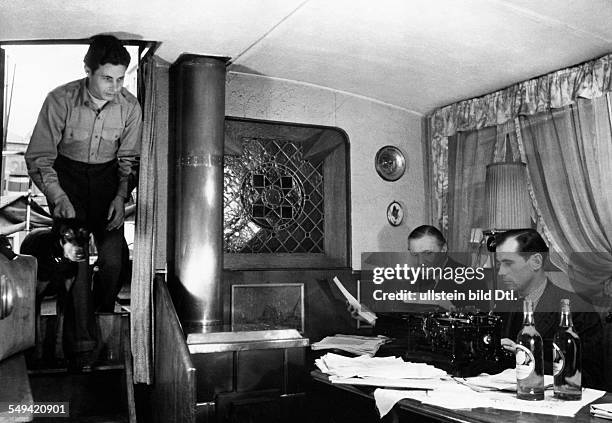 Federal Republic of Germany Hamburg Inside view of an office, established in a house boat - ca. 1952 - Photographer: Heinz Fremke - Published by:...