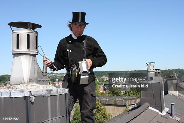 Germany, Wuppertal. Chimney sweep
