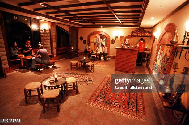 Turkey, Belek, 09.2002: Sirene Golf Hotel.- Touristes in the bar of the hotel.