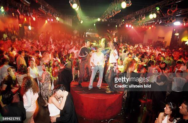 Germany, Bochum, 06.2002: Turkish Nights in the Ruhr Area.- Europes greatest Turkish discotheque TAKSIM ; Guelcan dancing with the Turkish boygroup...