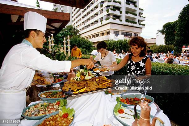 Turkey, Antalya: Falez hotel, dinner out in the garden.