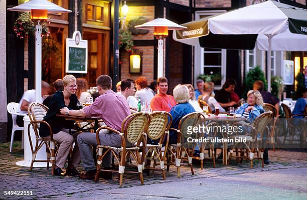 Germany, Luenen: Old part of town.- Energy; gas heat radiators in a beer garden.
