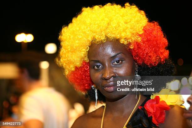 Germany, Dortmund: Match Germany versus Italia: woman from Kenia are sad about the game.