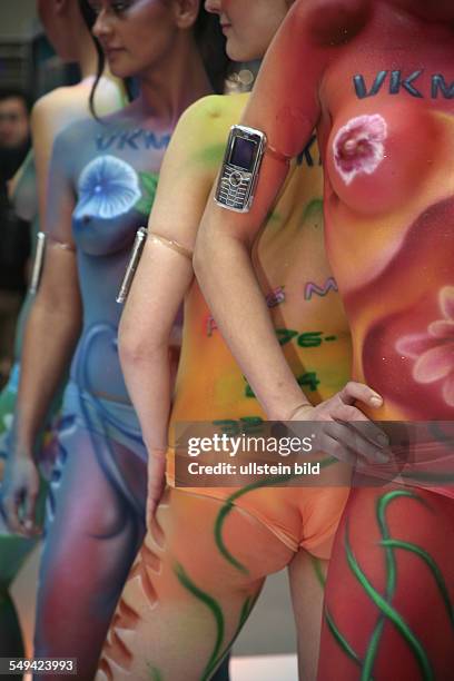 Germany, Hannover, Promoter at the CeBit 2006; bodypainting.