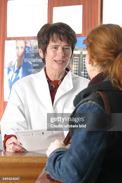 Germany, Essen, medicine physicist and non-medical practitioner Holger May, manager of the Laser Forum Essen. A patient at the registration....