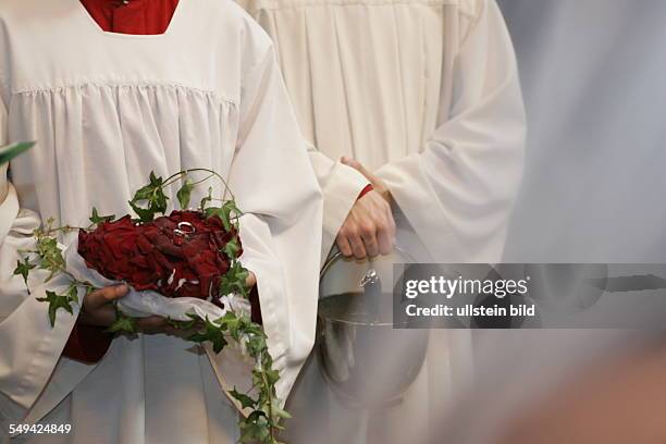 Germany: The wedding couple in front of the altar.