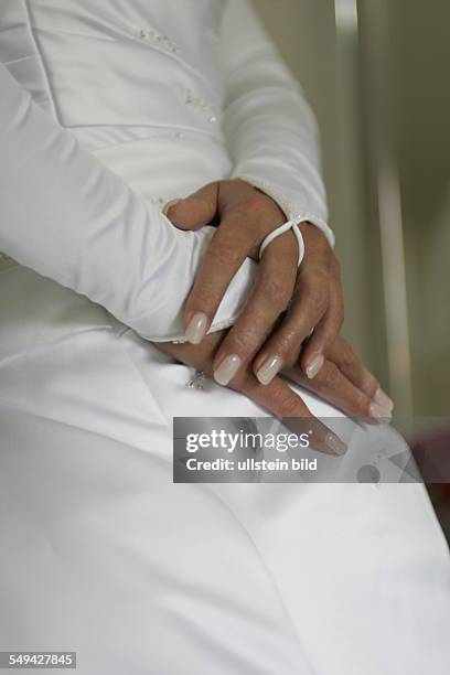 Germany: The hands of the bride.