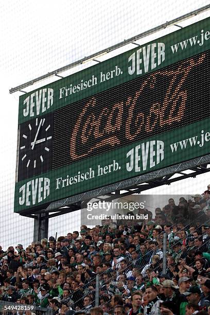 Germany: A soccer stadium.- View at the stand and the scoreboard.