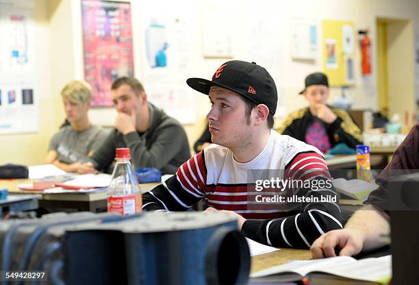 Apprentices in Electrical Engineering during lessons in a training centre in Bonn