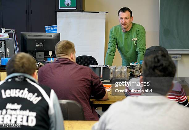 Apprentices in Electrical Engineering during lessons in a training centre in Bonn