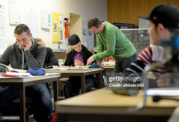 Apprentices in Electrical Engineering during lessons in a training centre in Bonn