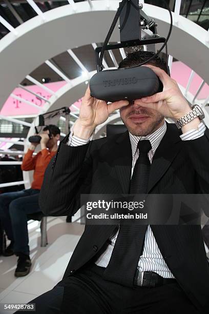 Germany, Hannover, : Cebit 2006.- The exhibition stand of the Deutsche Telekom AG.